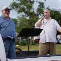 Pastor Rodney Fritz, left, and KNDY radio owner Bruce Dierking have done the announcing at the parade for years, entertaining the crowd while talking about each of the floats.