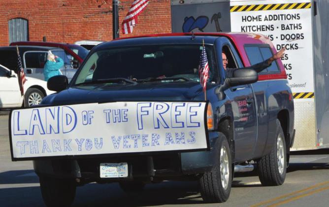 Dan Deaver drives in the parade thanking veterans for providing the “Land of the Free.”