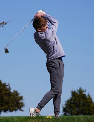 Brigham Bruna, a Hanover senior, finishes his swing on his way to a 15th place finish at Cedar Hills Golf Course.