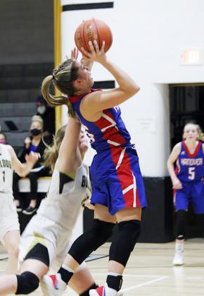 A quick slash to the basket gives Hanover junior guard Avery Behrends a good look at scoring. She led the Wildcats with 14 points in Tuesday’s game against Linn.