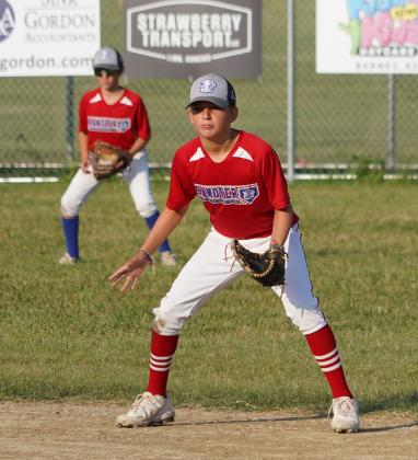 Davis Becker is ready in the space near first base while Hanover was on defense.