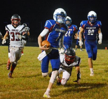 Hanover quarterback Jacob Jueneman breaks away from the pack for a touchdown run.