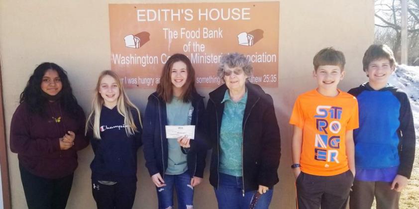 A check was presented to Jeannie Walker, third from right, of Edith’s House by students, from left, Allisson Cisneros, Macie Gepner, Anna Goeckel, Walker, Tanner Baker and Kale Miller.