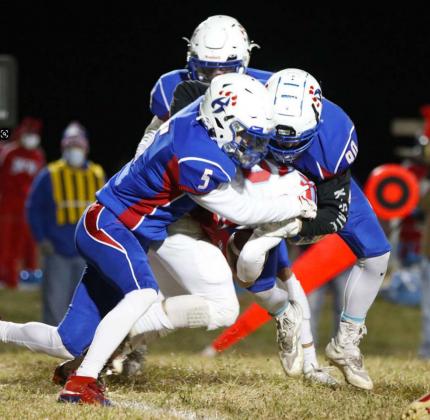 Braelen Stallbaumer (#5) and Blake Hynek (#90) team up to take down the Colony-Crest ball carrier. The Wildcat defense only allowed 29 yards rushing and 11 yards passing on Friday, while forcing three turnovers. Photos by JULIE DOEBELE